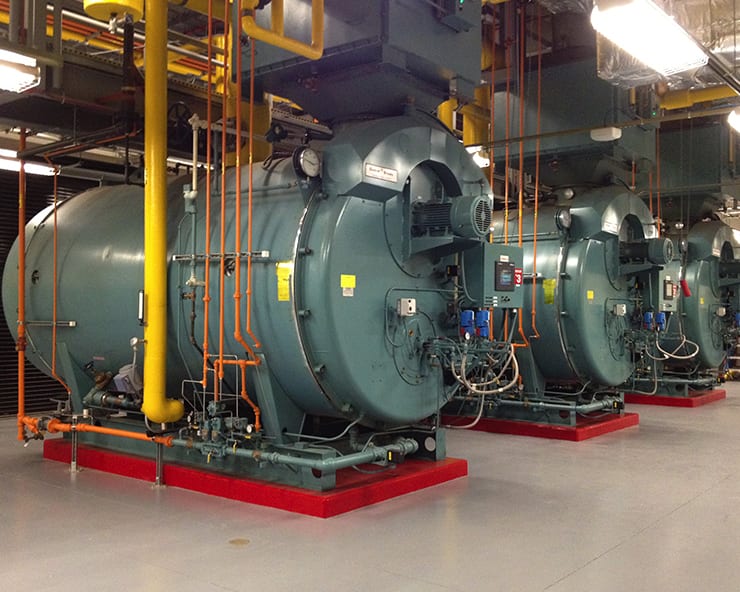 Pharmaceutical Steam Boiler Cleaning Case Study. Image of the boiler room at a pharmaceutical company.